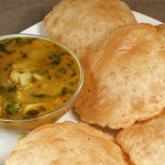 Aloo Puri (Potatoes with Fried Puffed Bread)