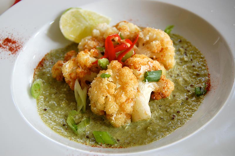 Coconut Crusted Cauliflower with Cilantro Curry Sauce